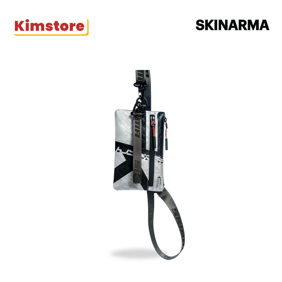 skinarma clutch comet silver